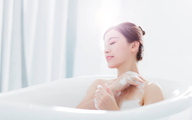 istock young woman take a bath in bathtub 1269972060