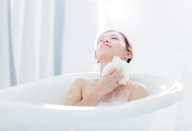 istock young woman take a bath in bathtub 1269972077