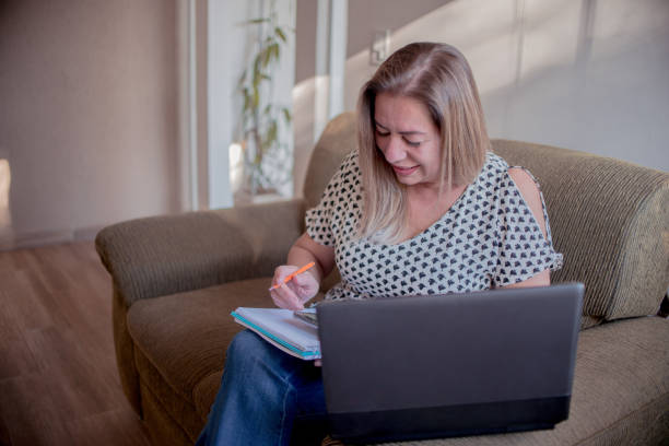 istock Woman working at home 1269972770