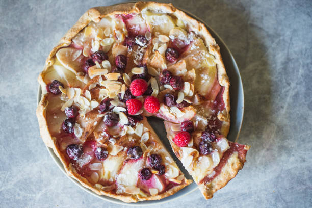 istock Galette with pear, berries, almonds shot from above 1269989879