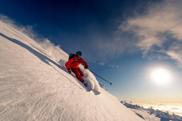 istock Powder skiing at resort 1269989918