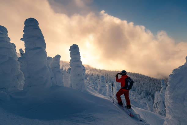 istock happy skier taking smart phone picture. 1269990000