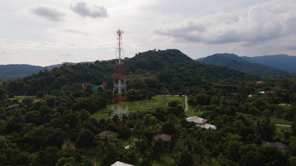 istock Aerial view telecommunication tower in village 1269990116