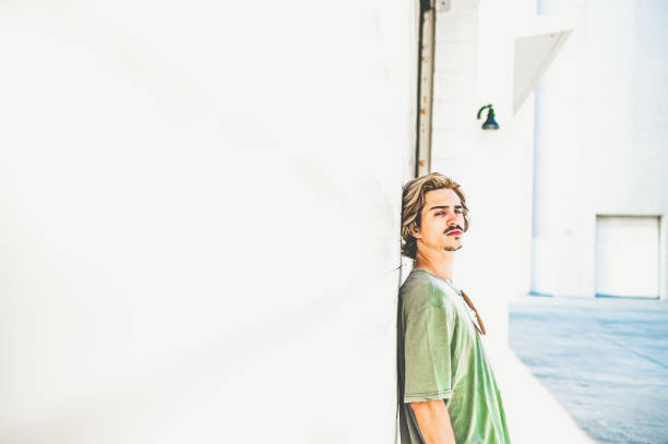 istock Millenial age guy in serious portrait with copy space 1269990797