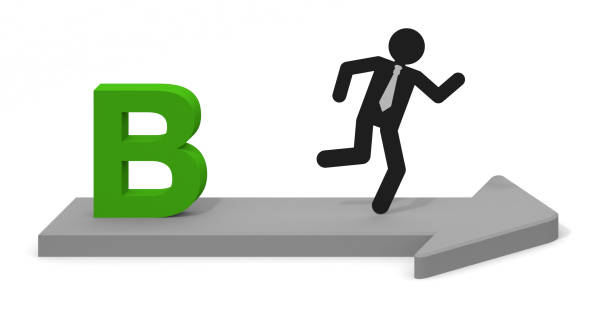 istock The letter B. Three-dimensional arrow. Businessman running. Select B course. 1269992562