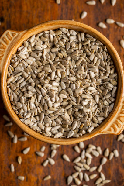 istock Peeled sunflower seeds in bowl 1269993623