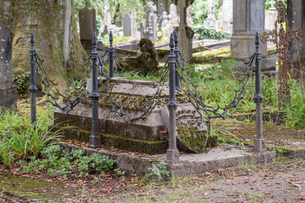 istock tomb with marble poles with chains 1269994675