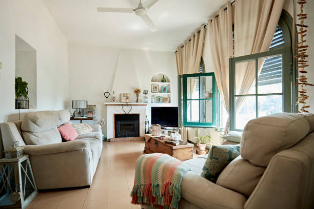 istock Comfortable Living Room with Open Windows and Curtains 1269997033