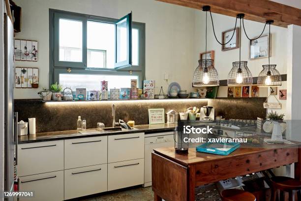 Eclectic Style Domestic Kitchen In Spanish Home Stock Photo - Download Image Now - Eclectic Style, Rustic, Pendant Light