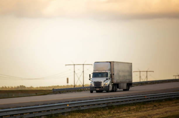 istock White Semi Truck on the highway Florida 1269997301