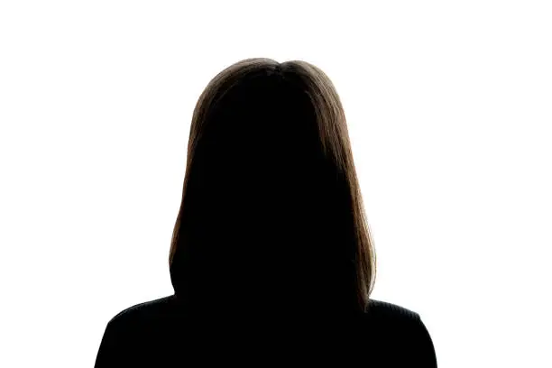 Photo of Dark silhouette of girl on a white background, the concept of anonymity