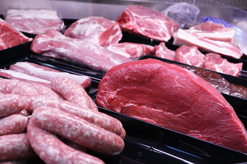 Variety of fine meat products in the butchery