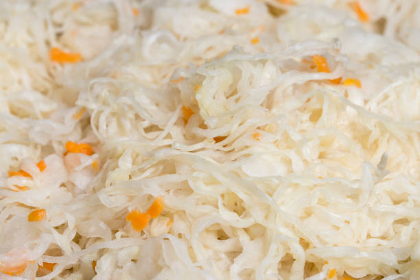 Sauerkraut, sour cabbage on plate closeup