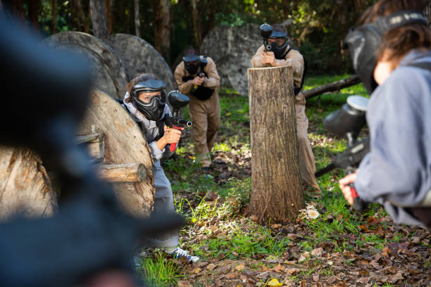 istock People playing paintball outdoors 1270002642