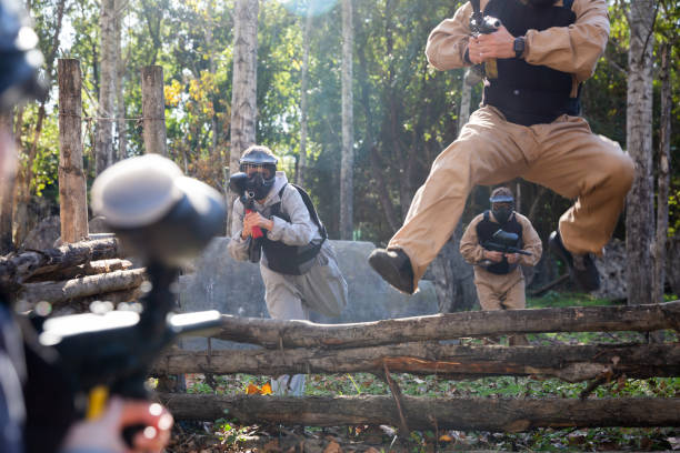istock People in full gear playing paintball 1270002644