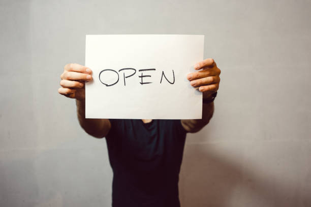 istock Man holding paper sign 1270007507