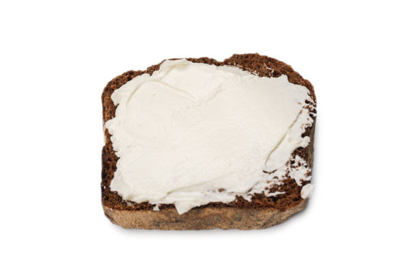istock Brown bread and cheese isolated on white background. 1270007787