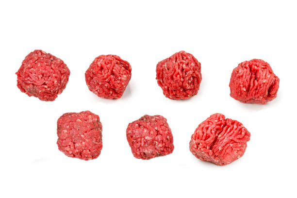 istock Raw meat balls isolated on white background. 1270007806