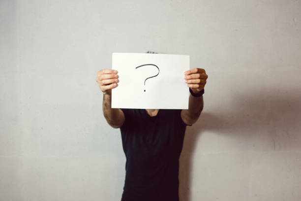 istock Man holding paper sign 1270008449