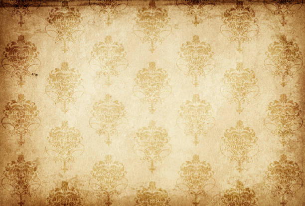 istock Old grunge paper with floral patterns. 1270008720