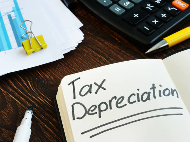 istock Tax depreciation phrase on the notepad page. 1270010048