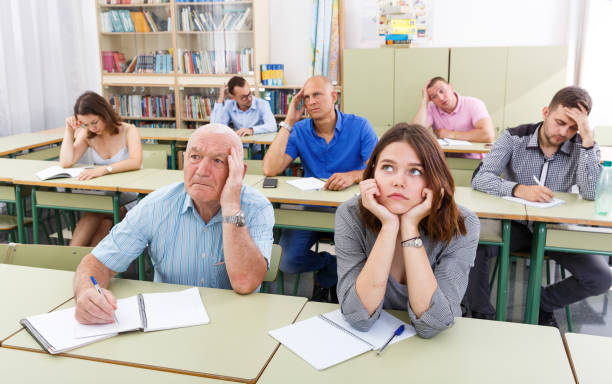 istock Men and women listening task for exam 1270011574