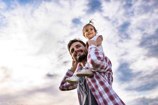 istock Father and daughter exploring nature together 1270017585