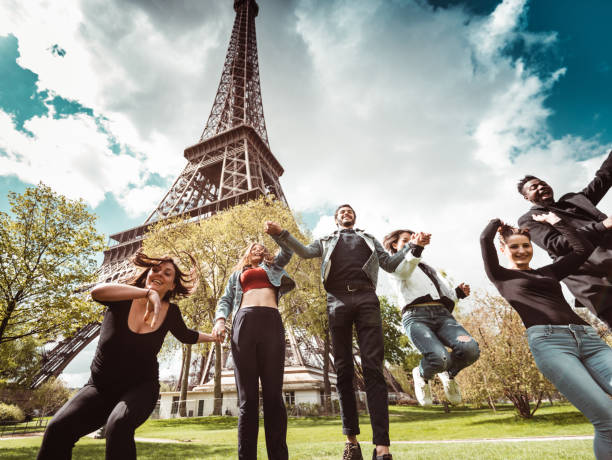 istock happiness student jumping all together in paris 1270022720