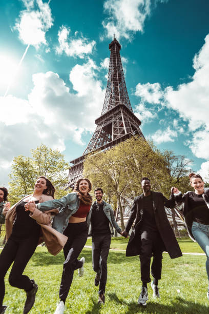 istock happiness student jumping all together in paris 1270022759