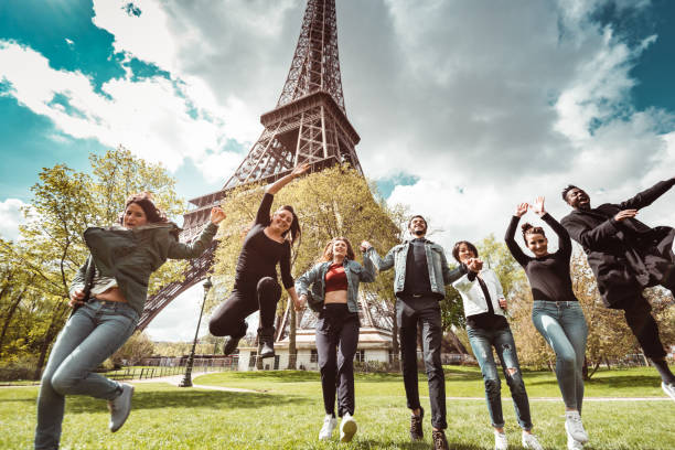 istock happiness student jumping all together in paris 1270022810