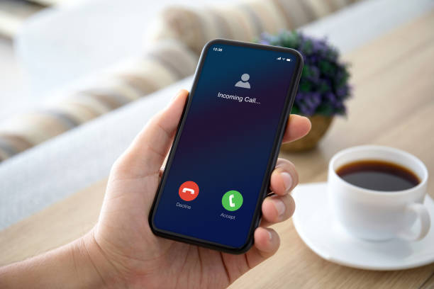 istock male hands holding phone with incoming call on the screen 1270023889