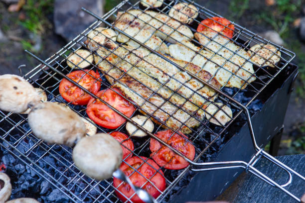istock bbq concept fish on fire with mushroom and tomatoes 1270024059