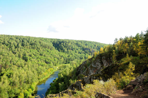 istock A calm winding river flows through the taiga on a warm sunny day. Berd river, 1270024079