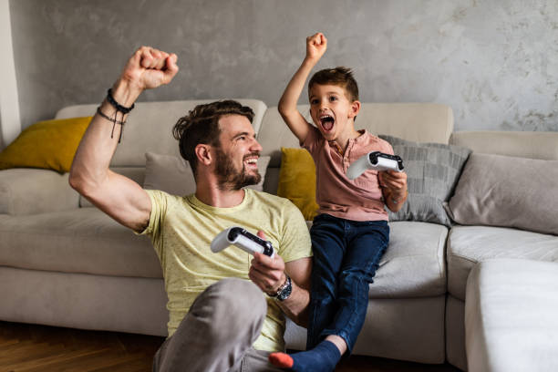 istock Playing video games with my dad 1270028836
