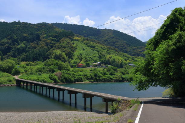 istock Misato subsidence bridge, early summer with beautiful fresh greenery (Shimanto City, Kochi Prefecture) 1270030196