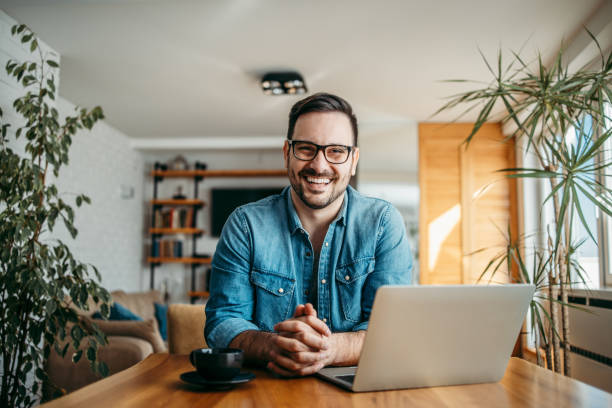 istock Portrait of a happy freelancer at home office. 1270030219