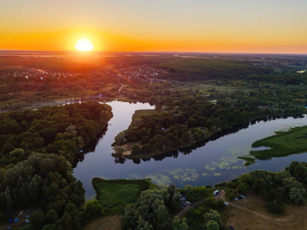 istock Sunset above the river in natural rural landscape 1270031793