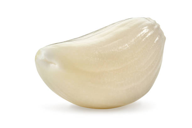 Macro shot of one raw, peeled garlic clove, isolated on white background. Vegetable, spice. Ripe summer harvest. Close up, copy space Macro shot of one raw, peeled garlic clove, isolated on white background. Vegetable, spice. Ripe summer harvest. Healthy nutrition. Close up, copy space Relish stock pictures, royalty-free photos & images