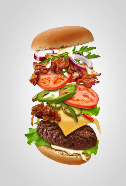 istock Big burger with flying ingredients against gray background. Ham, beef cutlet, cheese, mayonnaise, vegetables and greens. Close up, copy space 1270033125