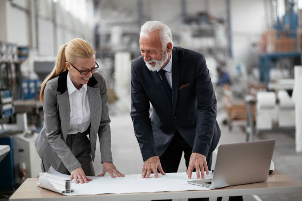 istock Colleagues working in factory 1270034697
