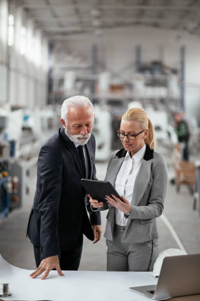 istock Colleagues working in factory 1270034804