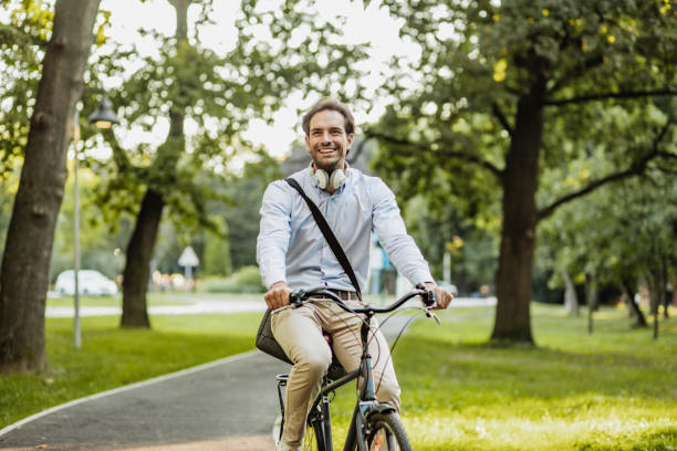 istock Man driving a bike in park 1270034859