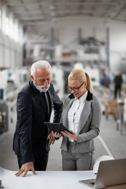 istock Colleagues working in factory 1270034937