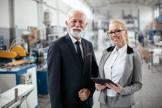 istock . Colleagues working in factory 1270035932