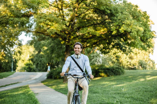 istock Man driving a bike in park 1270036571
