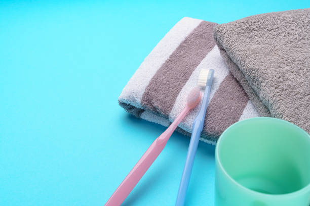 The toothbrushes and towel The toothbrushes and towel bad breath couple stock pictures, royalty-free photos & images