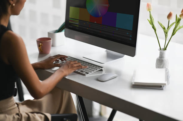 istock Cropped shot creative woman working with colour swatch in computer, Graphic designer working. 1270052356