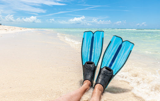 Snorkeling in turquoise water of the Keys, Florida.. Concept of luxury lifestyle. Active water sport.