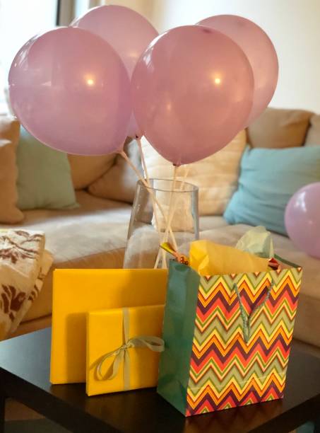 istock Birthday presents and balloons 1270054276