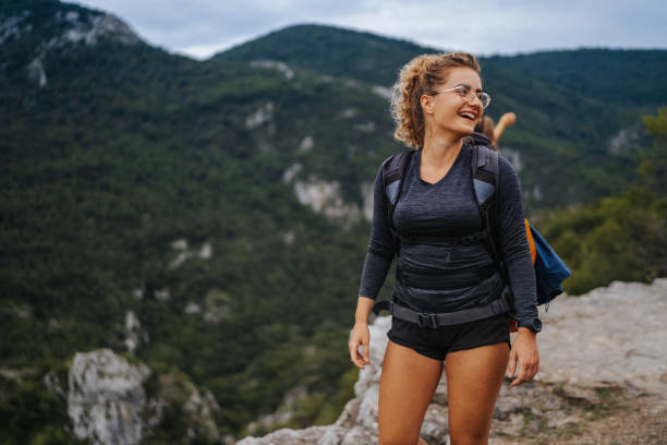 istock Two young female friends walking on rocky mountain 1270054284